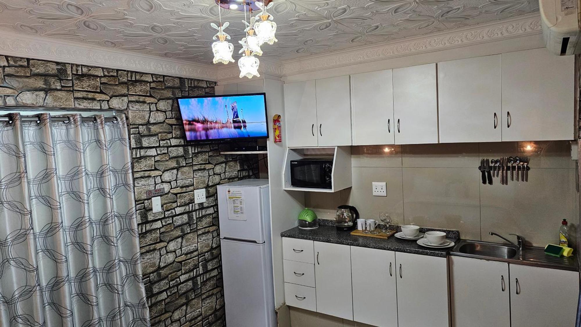 Rjs Guesthouse Дурбан Номер фото